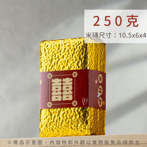 婚禮喜米桌上擺設，金色包裝搭配囍字設計，傳遞新人幸福心意